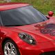 Illustration for article titled Is That Really A Snake Eating A Guy On The Alfa Logo?